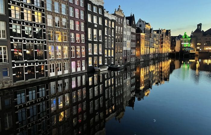 Historic canal and gabled Dutch houses in Amsterdam on a private guided tour
