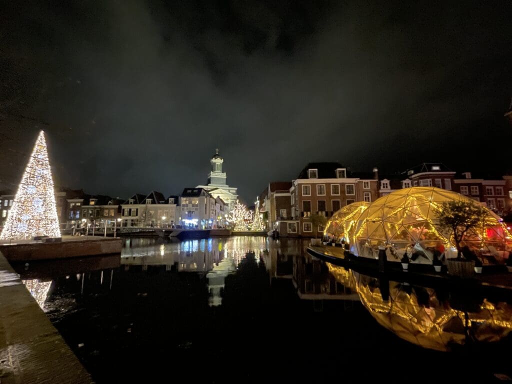 Leiden WinterWonderWeken Christmas market with floating ice rink on the canal