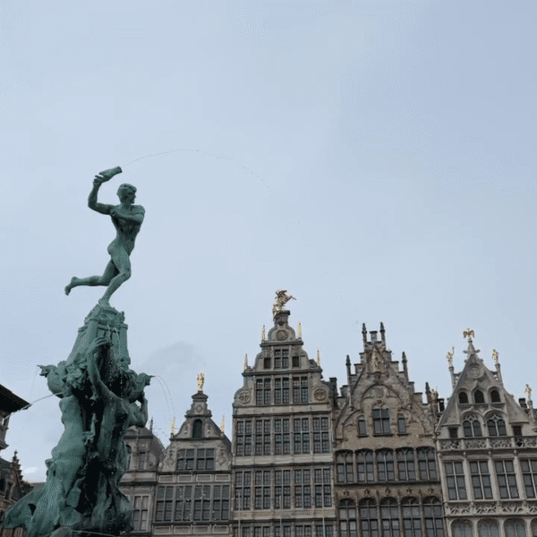 Guests on a private guided walking tour through a historic Belgian city