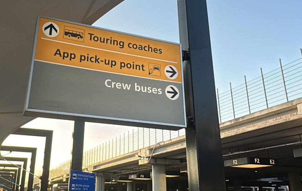 Taxi app showing pickup bay numbers at Schiphol Airport