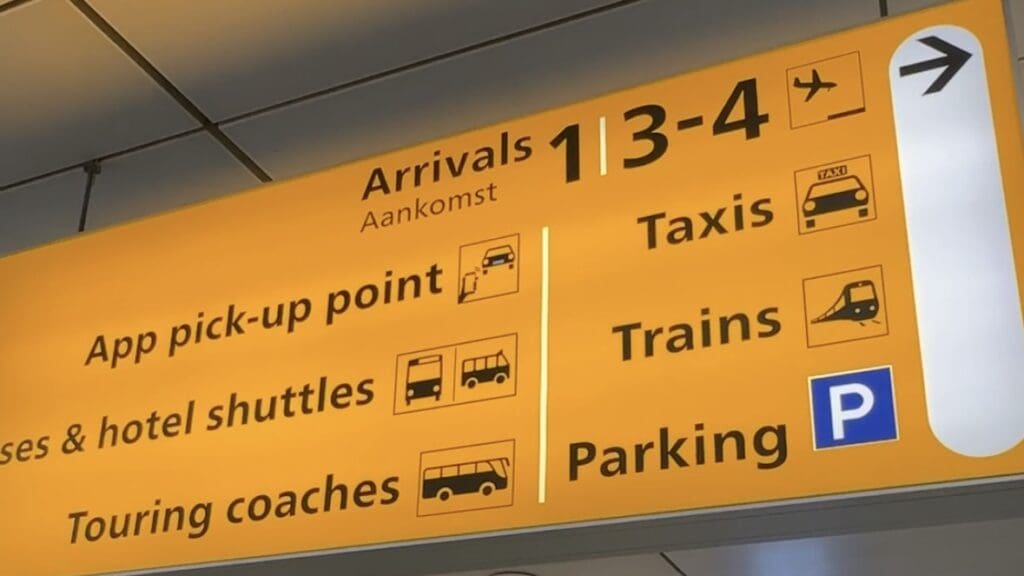 Taxi pickup sign at Amsterdam Schiphol Airport arrivals