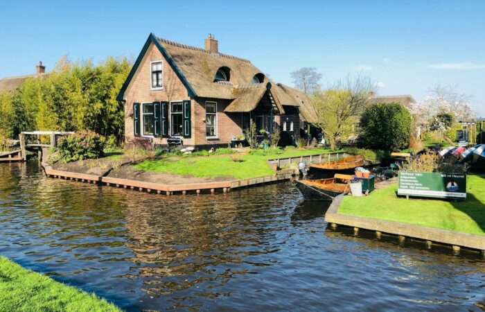 Thatched house beside a canal in Giethoorn