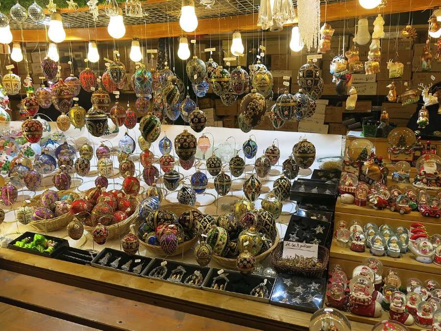 Glass Christmas baubles on a market stall (generic Christmas market detail)