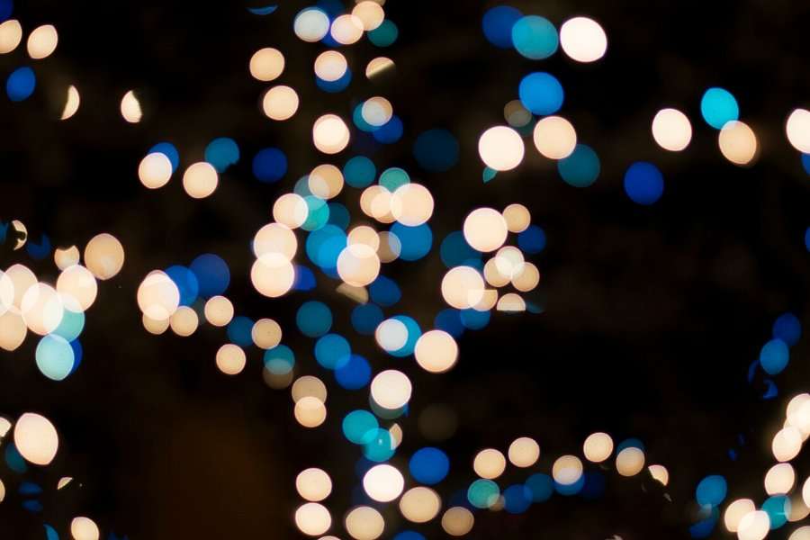 Out-of-focus Christmas lights at night (generic image)